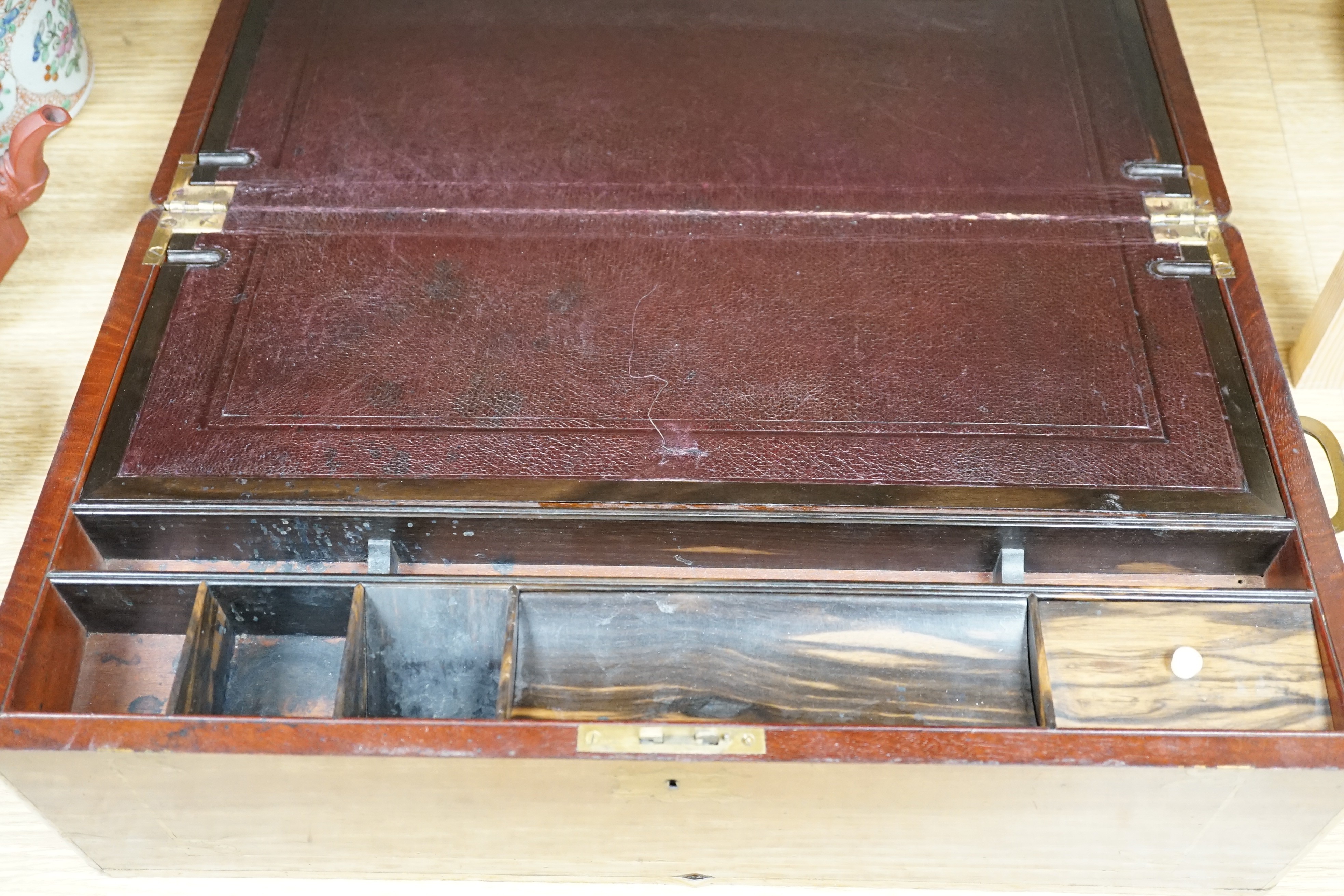 A brass inlaid mahogany writing slope, Coromandel covers to interior, 49cm wide